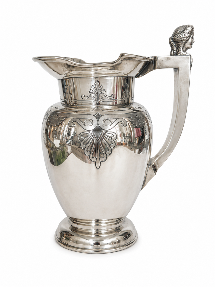 Silver plate pitcher with gorgeous etching and great shape top handle w/face
