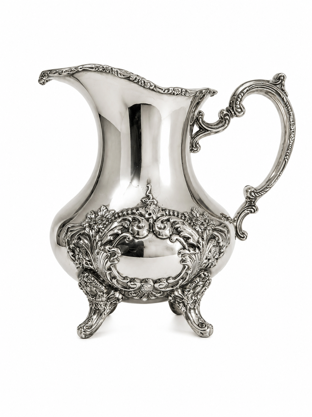 Silver plate pitcher ornate design
