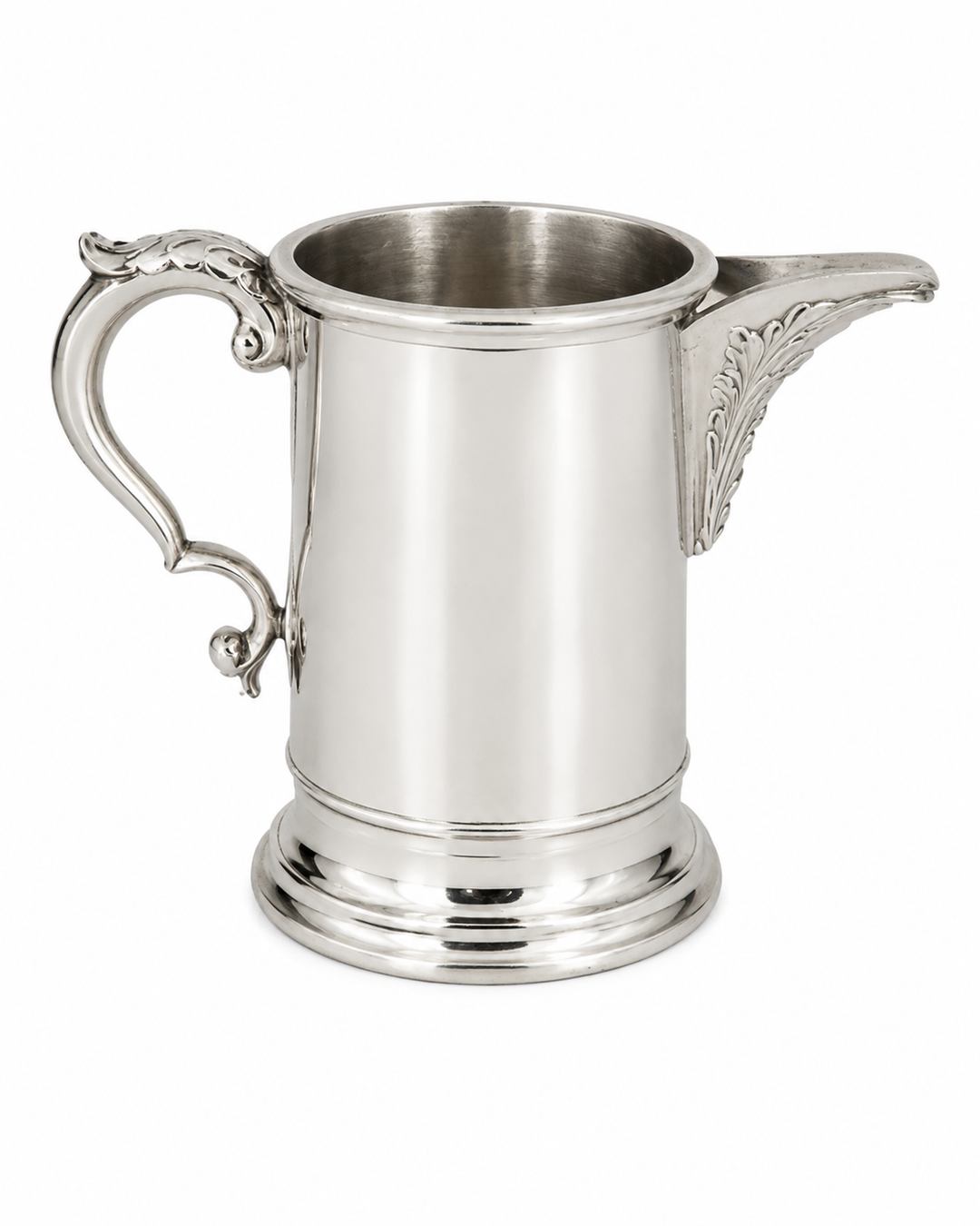 Silver mug with spout and handle